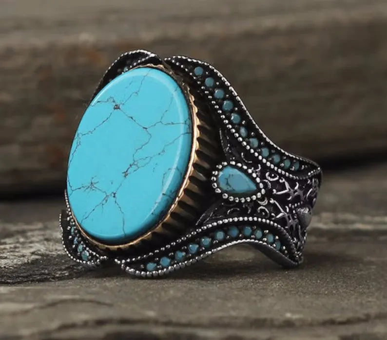 Men's round turquoise ring with antique silver alloy band available in sizes 6 to 13