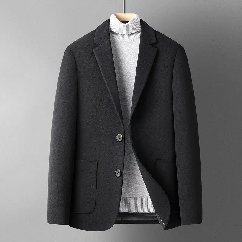 Men's slim-fit wool suit in grey on a hanger, showing single-breasted jacket and trousers.