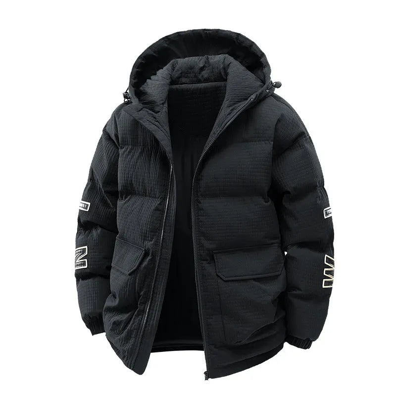Man wearing a black, Korean-style, hooded cotton-padded winter coat with side pockets.
