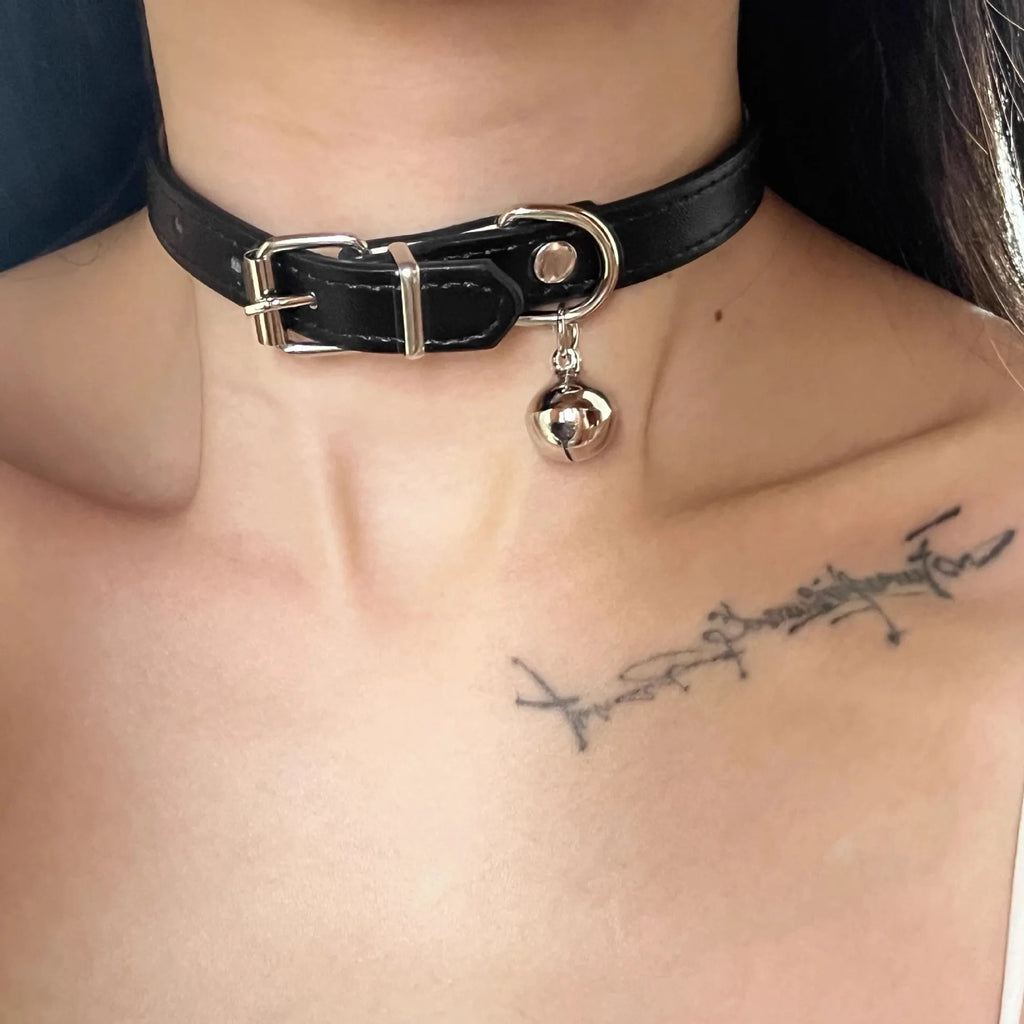 Black adjustable dog collar showing LD leather, bone, and cat paw design options.