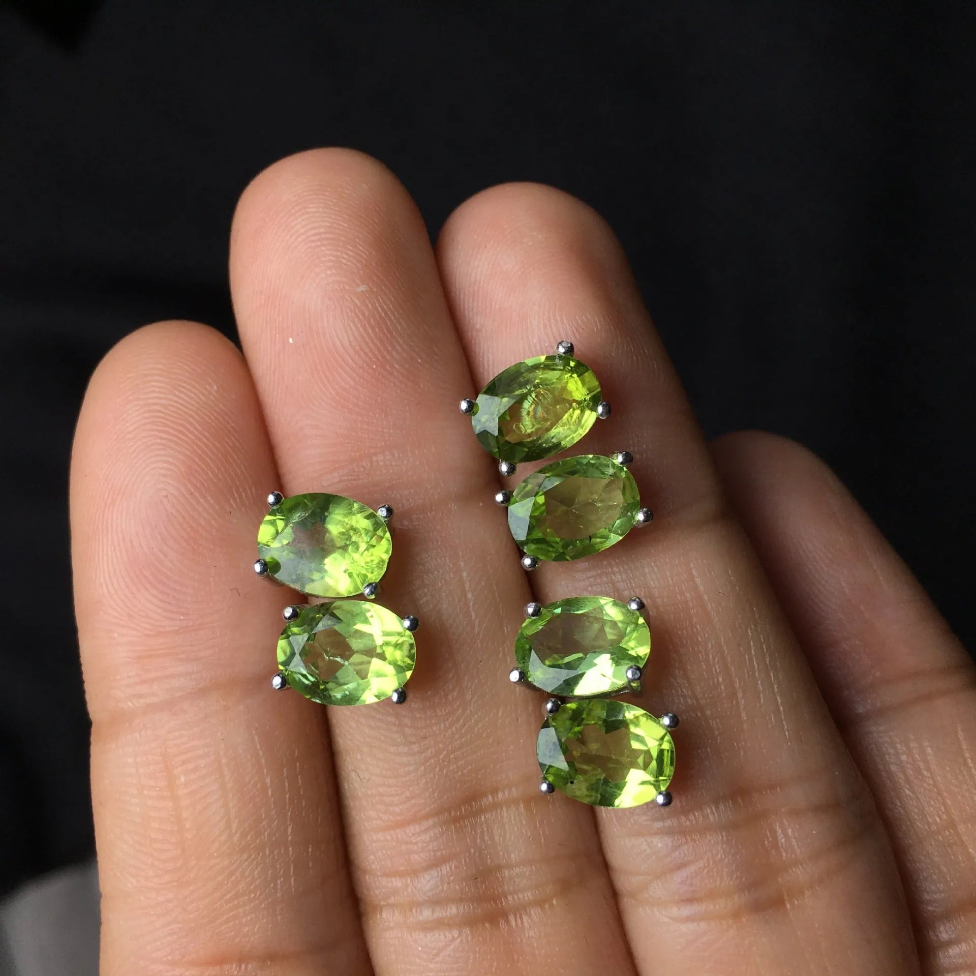 Natural grass green olivine faceted stud earrings in S925 sterling silver setting.