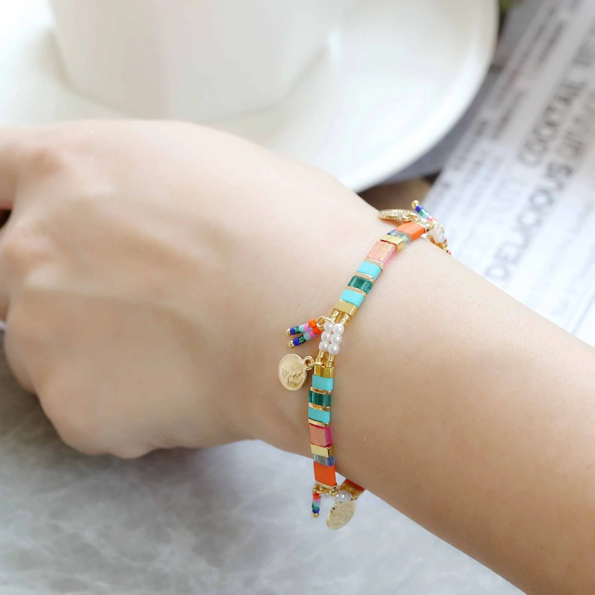 Women's handcrafted imitation pearl bracelet with glass coloured beads in European-American design