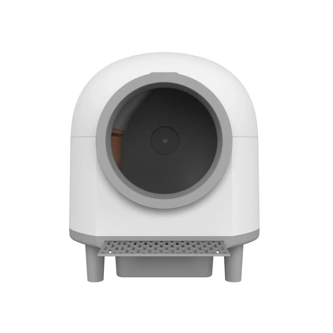 White automatic cat litter box with enclosed design for indoor use