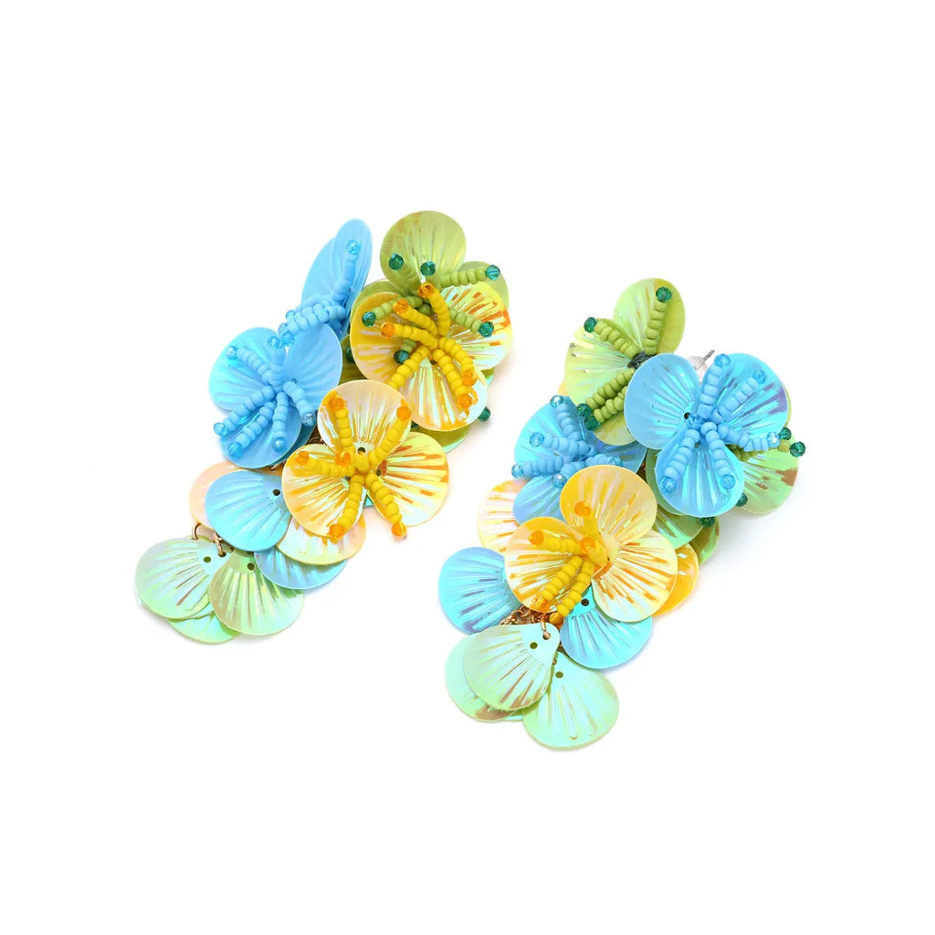Handmade colourful bead flower earrings with leaf designs in exaggerated dopamine style