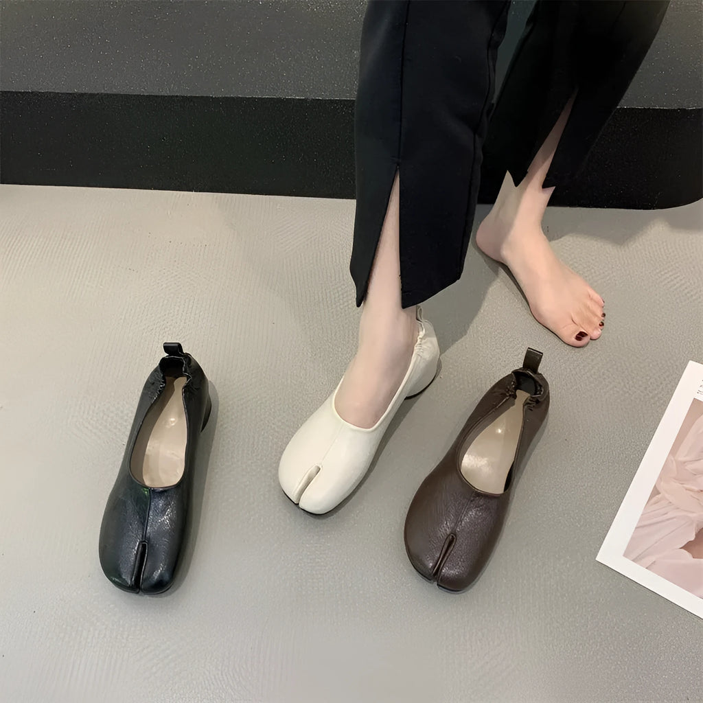 Women's split toe chunky heel pumps in black colour with round toe and low heel