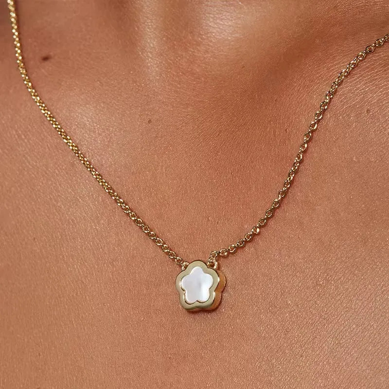 White mother of pearl shell flower necklace on O-shaped chain with gold or silver tone finish