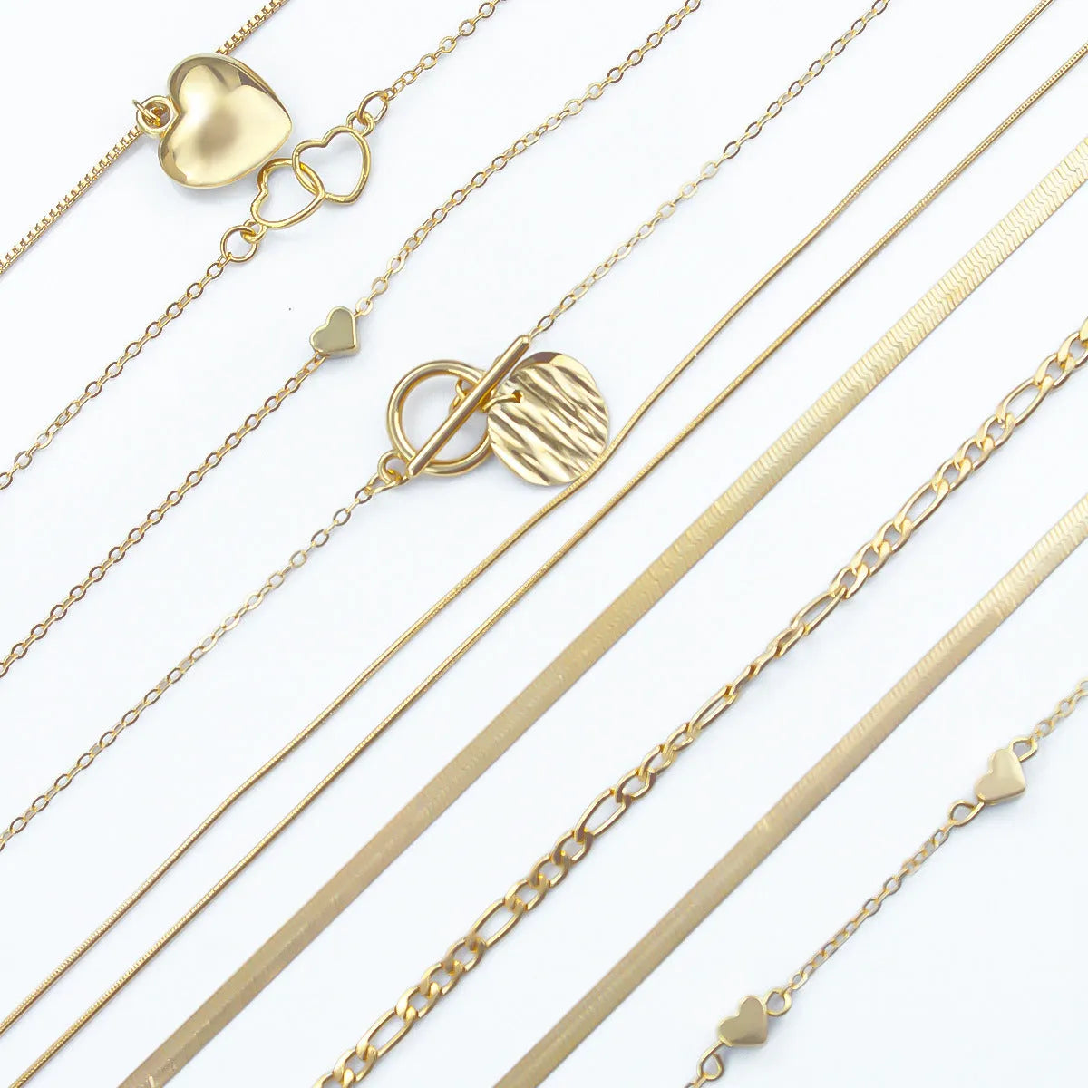 Gold electroplated women's necklace set with 10 alloy pendant pieces on snake bones chains
