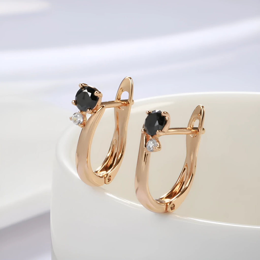 Women's black agate earrings with gold-plated copper construction and drop-shaped retro geometric design