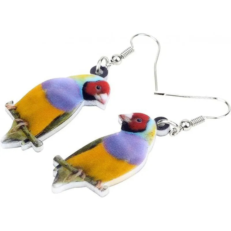 Close-up of women's acrylic earrings with a blue titmouse bird pendant and geometric snake motif design.