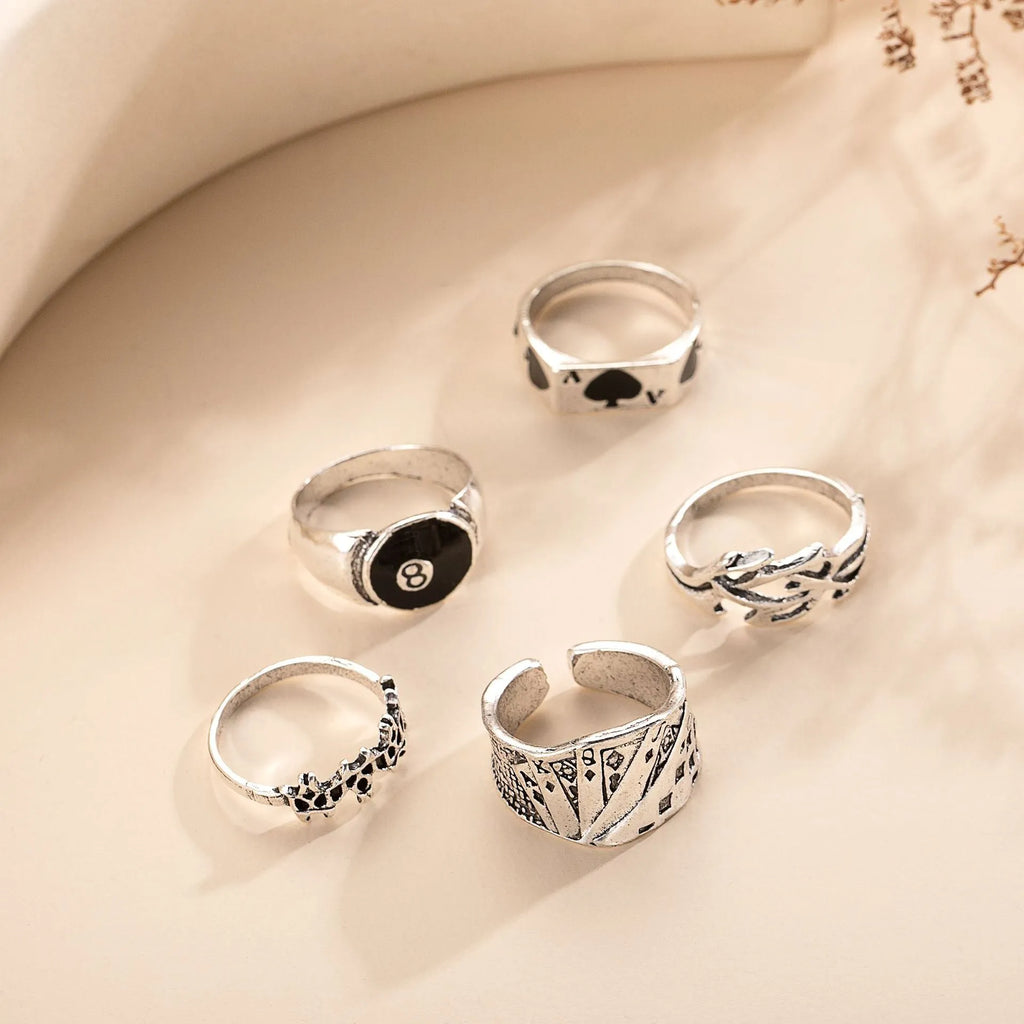 Black alloy ring with retro spade poker card design for female collectors
