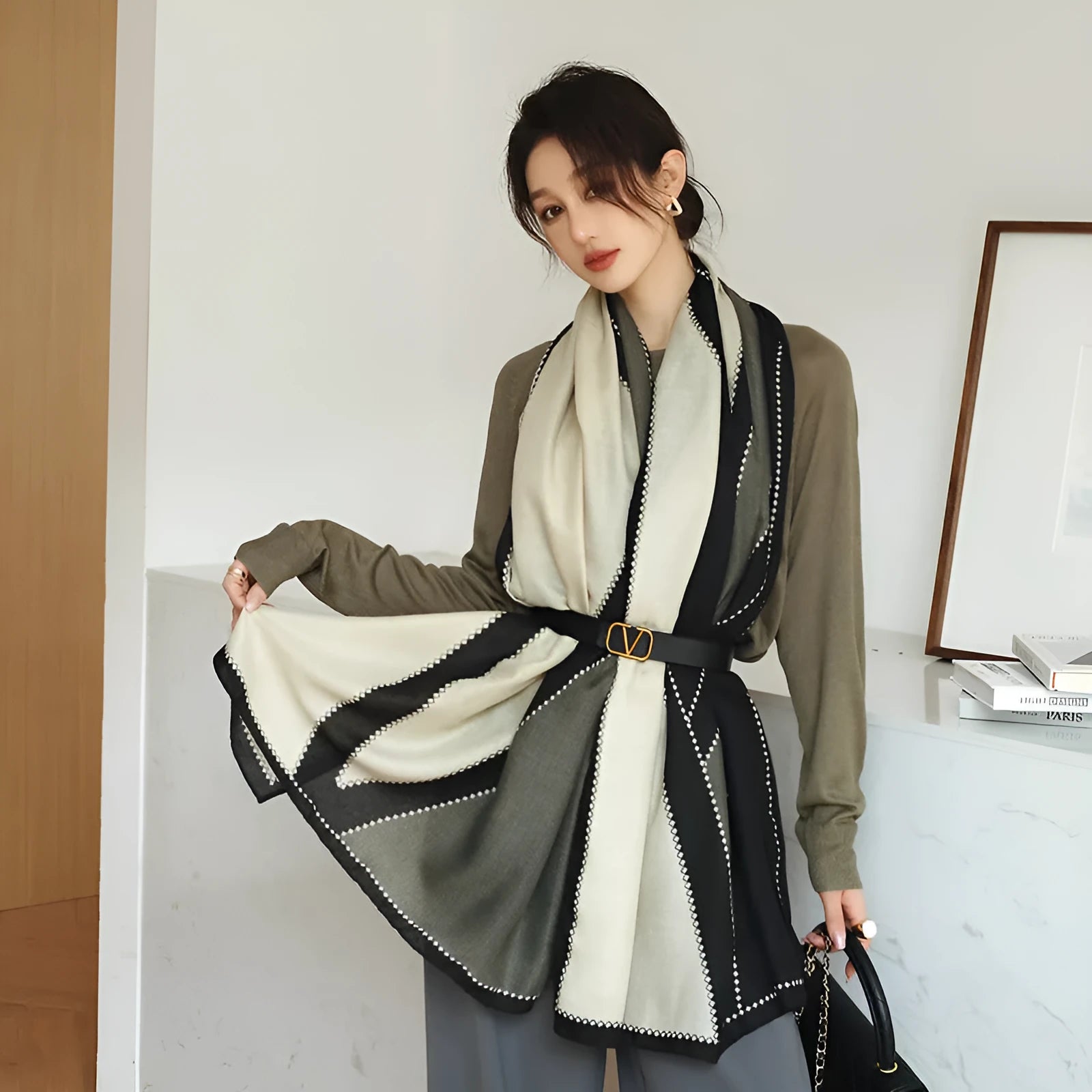 Women's printed polyester scarf showing decorative pattern and mid-length dimensions for autumn wear