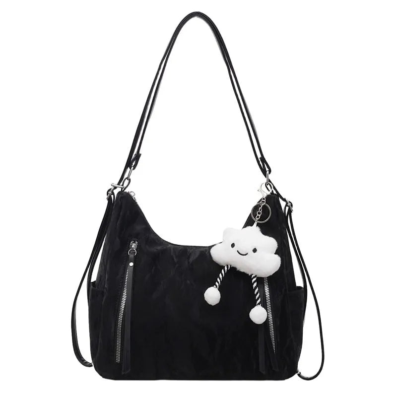 Women's soft PU fashion backpack in black with matching pendant accessory