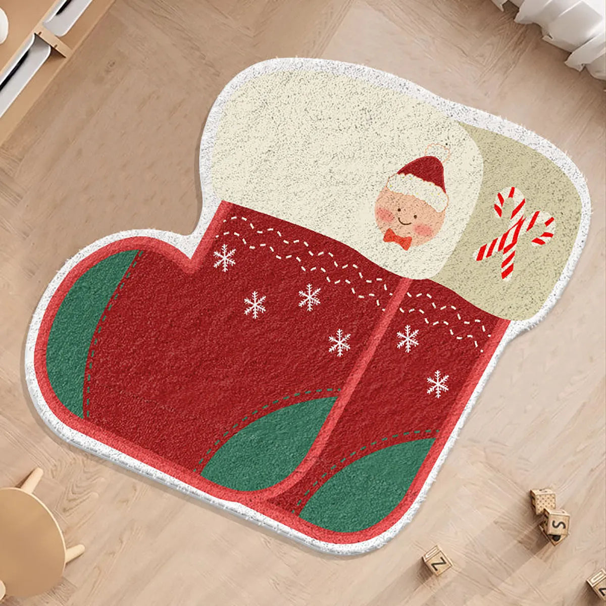 Round Christmas carpet with imitation cashmere fabric showing festive prints of gingerbread man and Christmas stockings