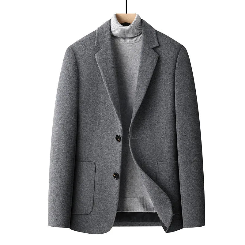 Men's slim-fit wool suit in grey on a hanger, showing single-breasted jacket and trousers.