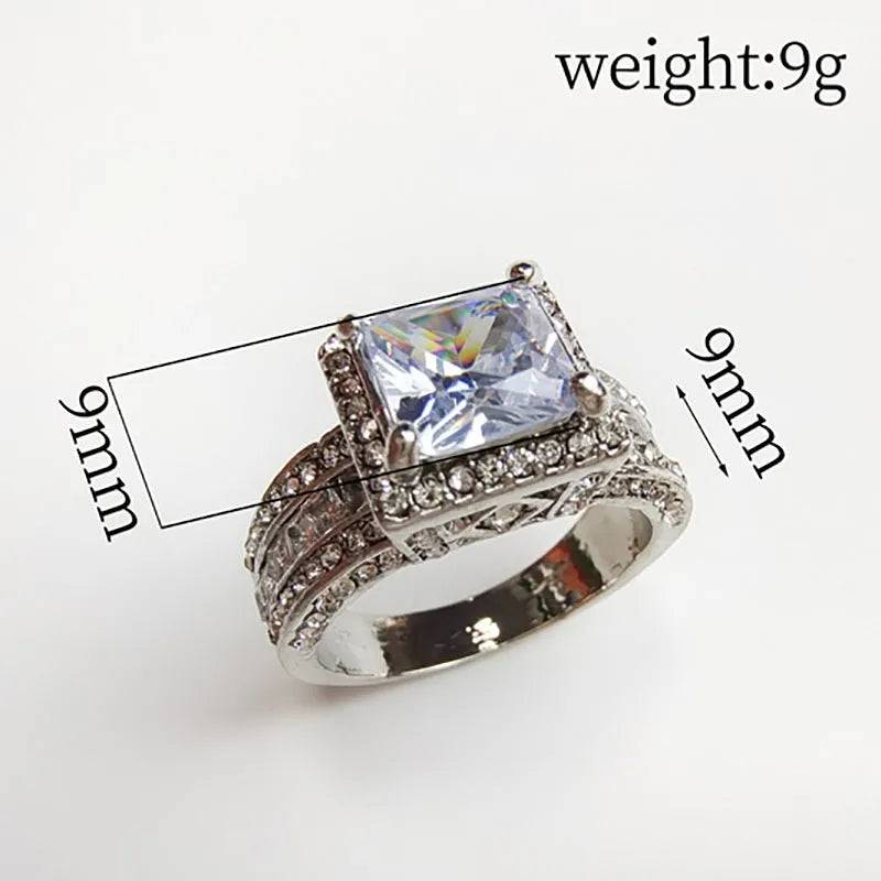 Electroplated alloy women's geometric engagement ring in gold or white colour on size display