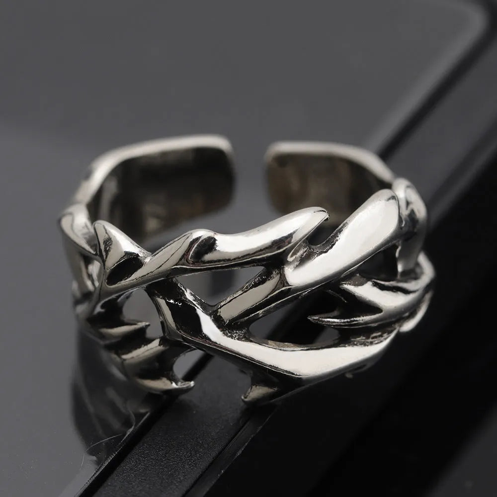 Copper adjustable flower ring with geometric thorn design in J2150 colour finish