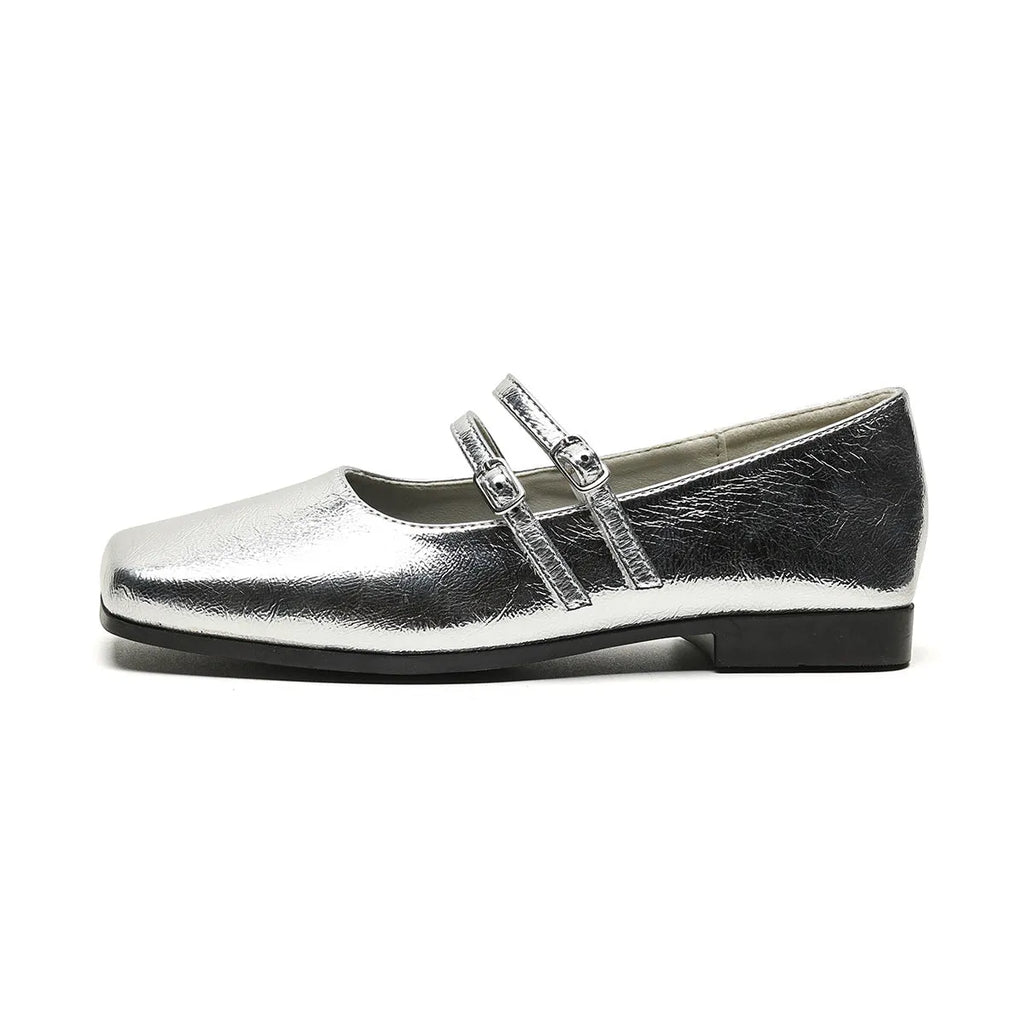 Silver women's Mary Jane shoes with cross buckle strap and flat heel