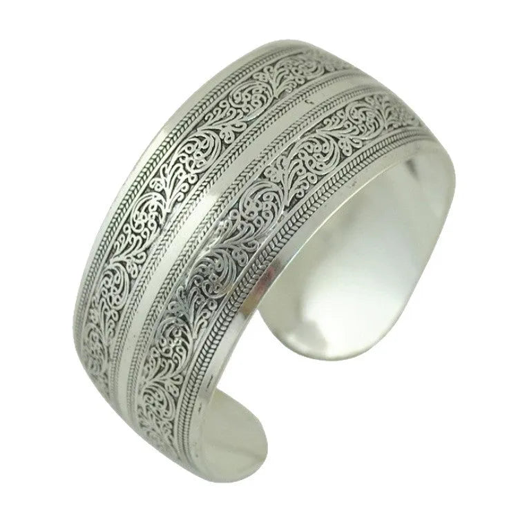 Ethnic style carved open Miao silver bracelet with Roman design on alloy material
