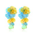 Handmade colourful bead flower earrings with leaf designs in exaggerated dopamine style