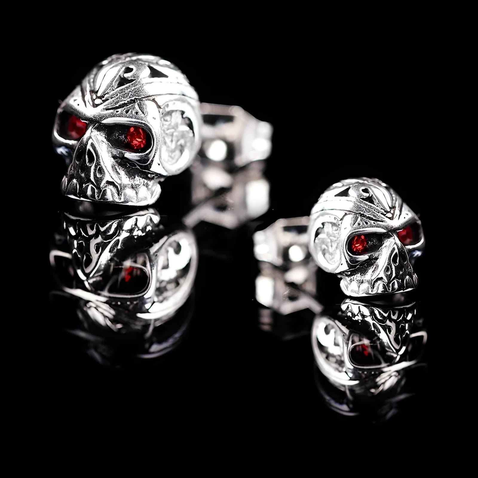 Retro-style skull stud earrings with red eye ghost head design in electroplated alloy metal