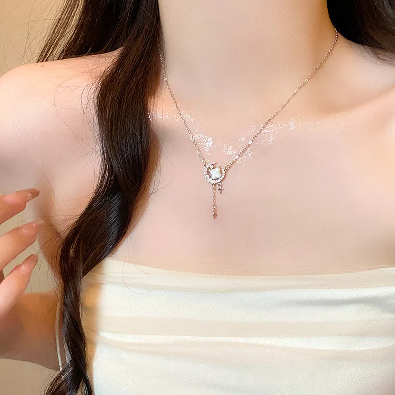 Gold star and moon necklace on adjustable copper chain with diamond treatment