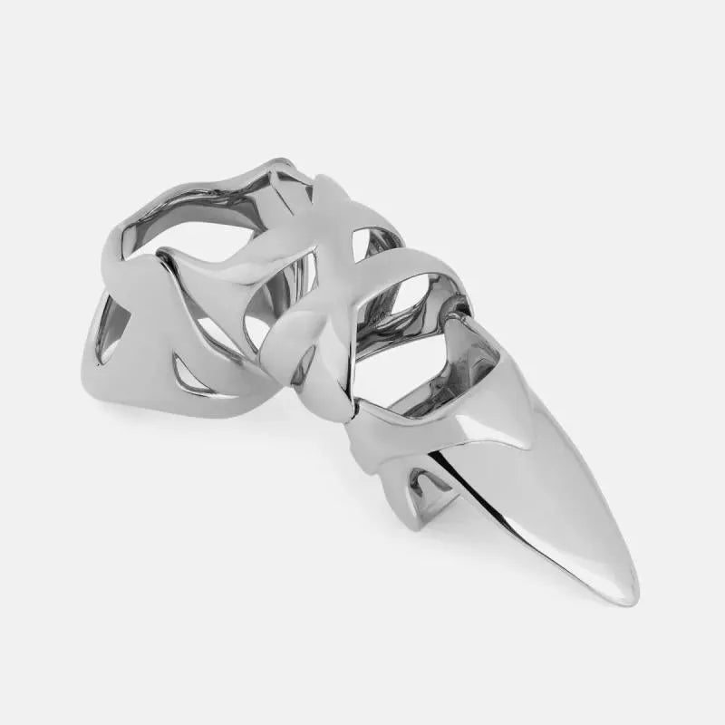 Silver-coloured alloy punk armour finger stall ring on a hand.