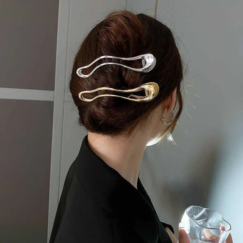 Women's zinc alloy hair barrettes showing square arc triangle shapes in gold and silver metallic finishes
