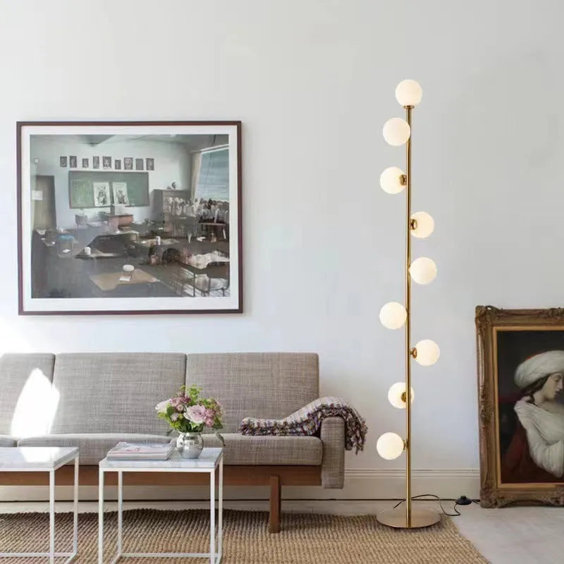 Minimalist Nordic floor lamp with marble base and wrought iron glass column
