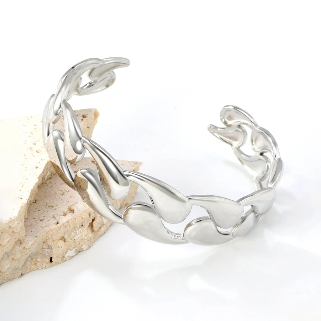 Adjustable stainless steel and alloy bracelet shown in gold-tone, silver-tone, and rose gold-tone colour options.