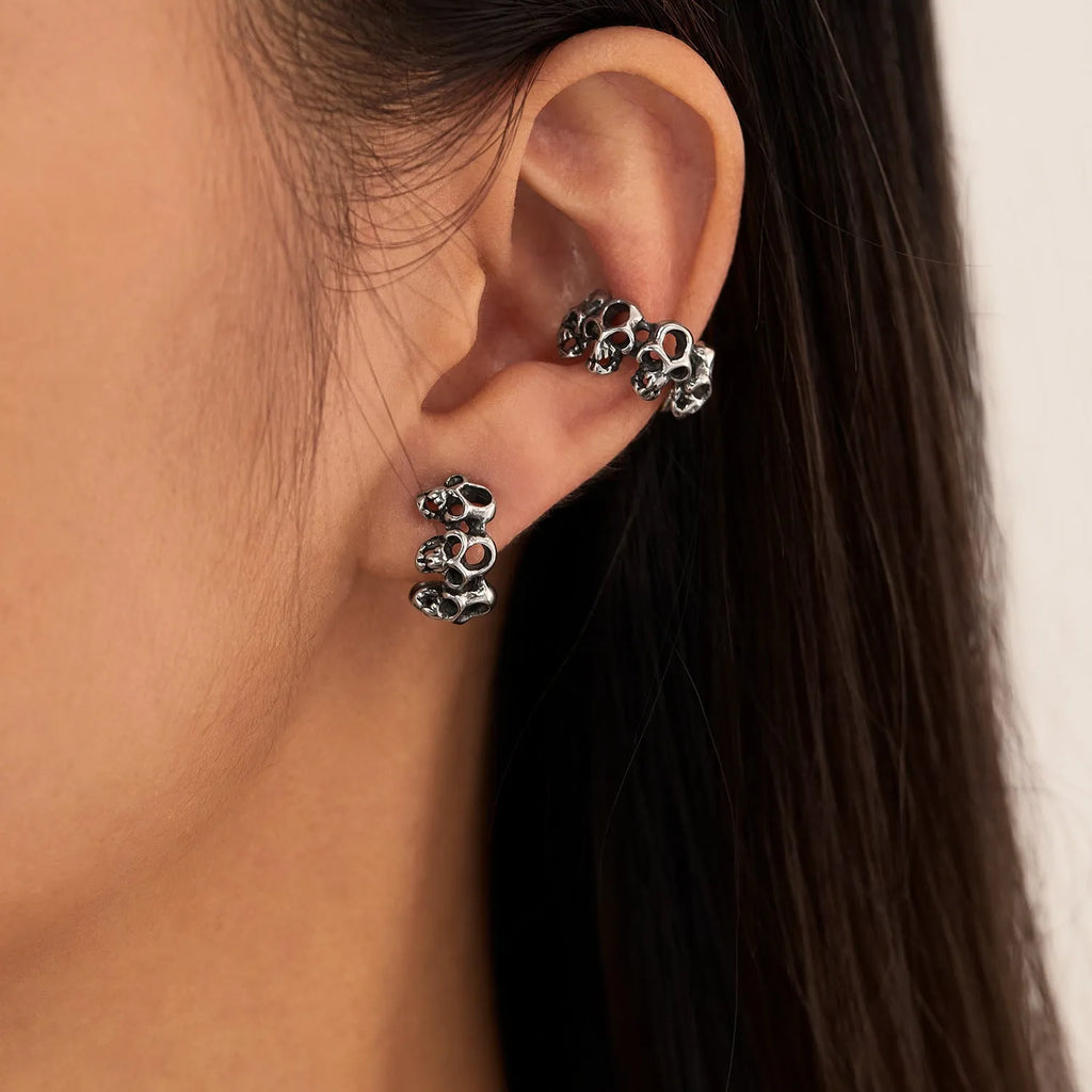 Stainless steel geometric hollow skull earrings with steel clip fittings