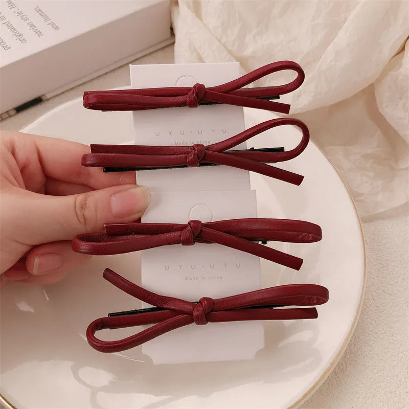 Wine red leather bow barrette hair clip for women with manual processing