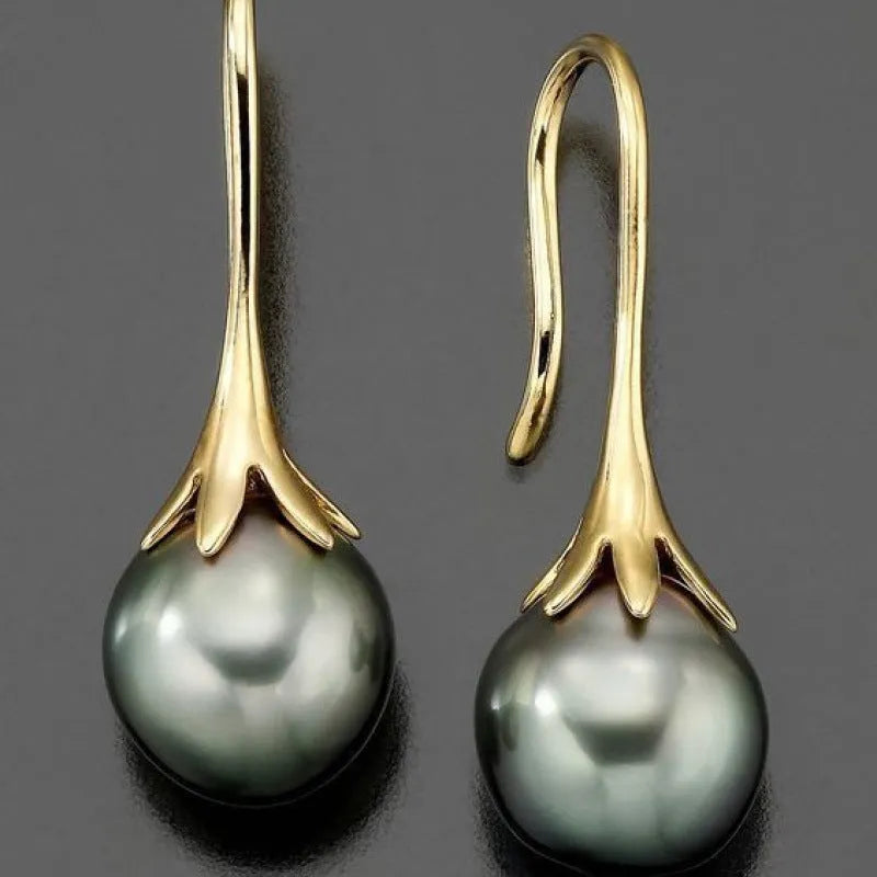 Women's retro fashion earrings with electroplated gold finish and dangly drop design