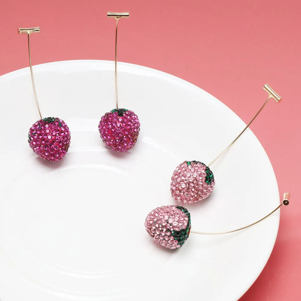Red geometric strawberry stud earrings made from zinc alloy for women.