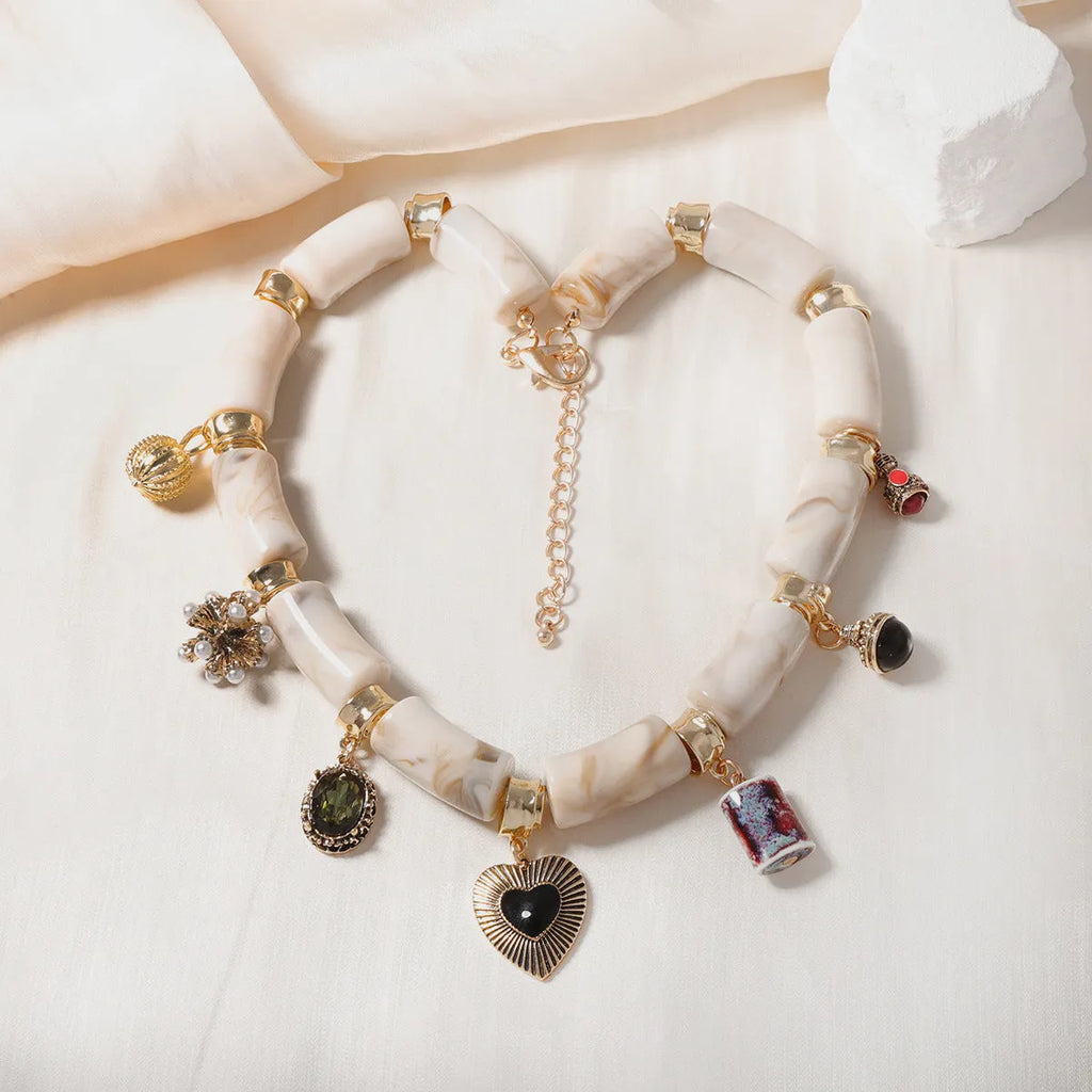 Heart-shaped resin bamboo necklace with electroplated finish on adjustable chain