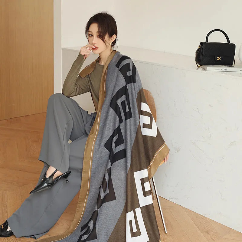 Women's printed polyester scarf showing decorative pattern and mid-length dimensions for autumn wear