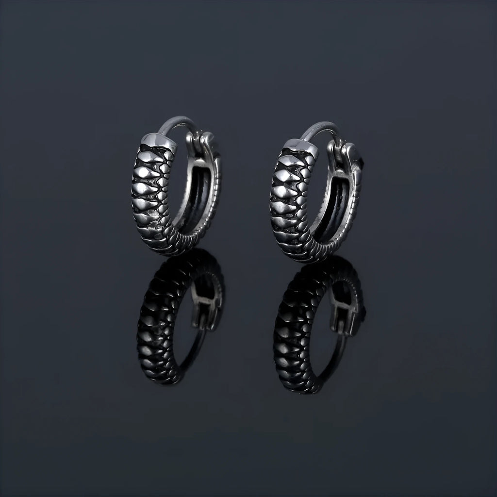 Silver geometric stripe earrings with retro twist design and sports style aesthetic