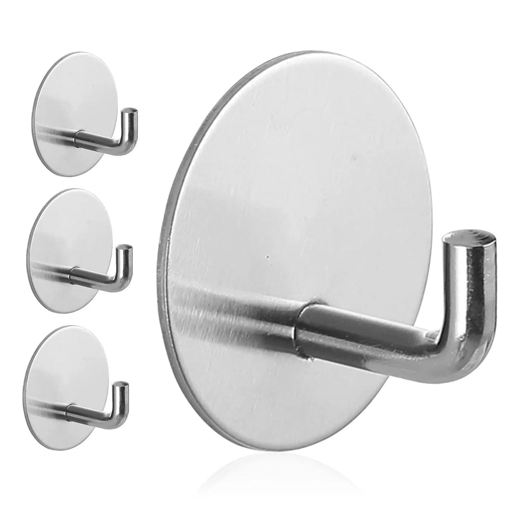 Self-adhesive stainless steel round hook in black and polished finishes for wall mounting.