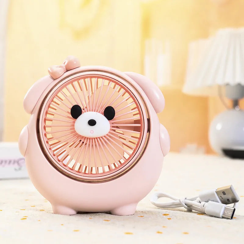 USB desk fan with bear and puppy design showing brown, apricot, and pink colour options.