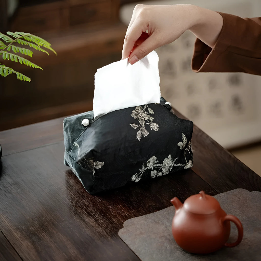 New Chinese brocade fabric tissue box with white plum embroidery, showing pearl buckle variant.
