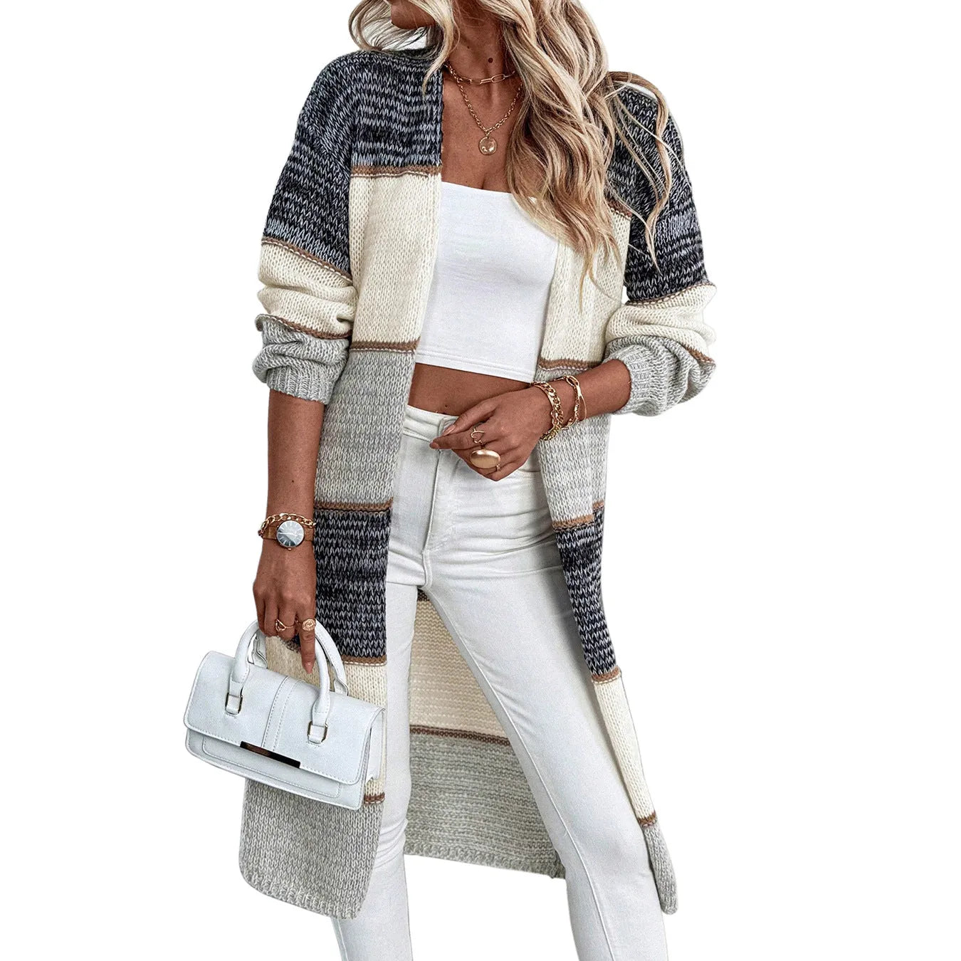 Grey loose fit women's knitted cardigan with long sleeves on a hanger.