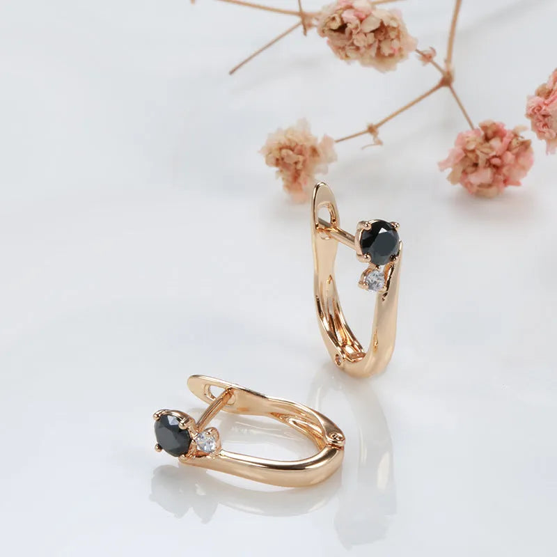 Women's black agate earrings with gold-plated copper construction and drop-shaped retro geometric design