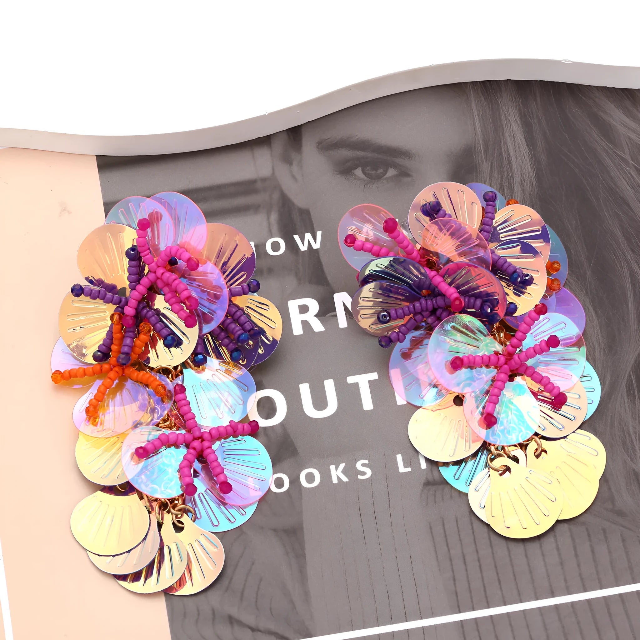 Handmade colourful bead flower earrings with leaf designs in exaggerated dopamine style