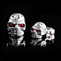 Retro-style skull stud earrings with red eye ghost head design in electroplated alloy metal