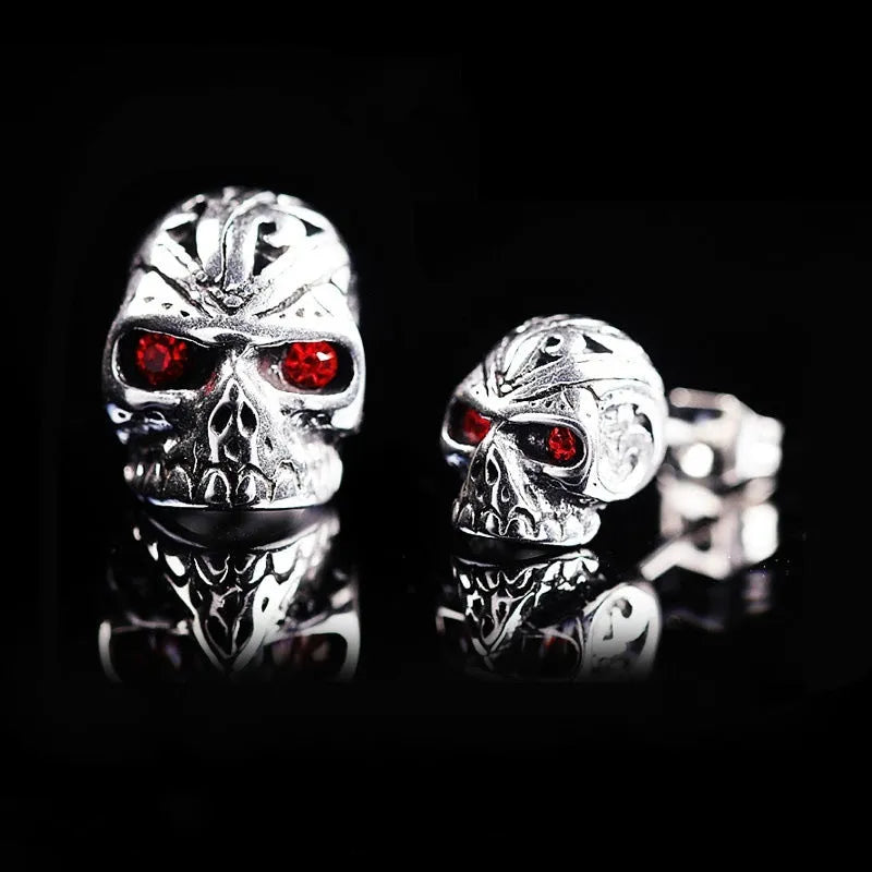 Retro-style skull stud earrings with red eye ghost head design in electroplated alloy metal