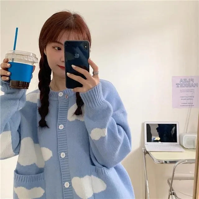 Blue cloud pattern loose spandex cardigan for women, shown as a pullover with long sleeves.