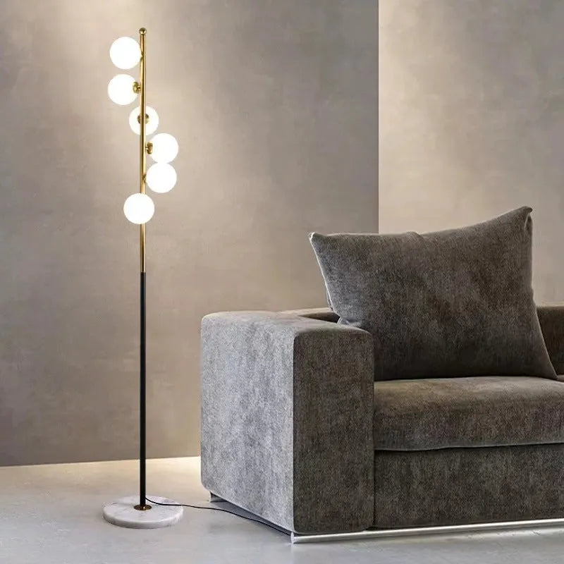 Minimalist Nordic floor lamp with marble base and wrought iron glass column