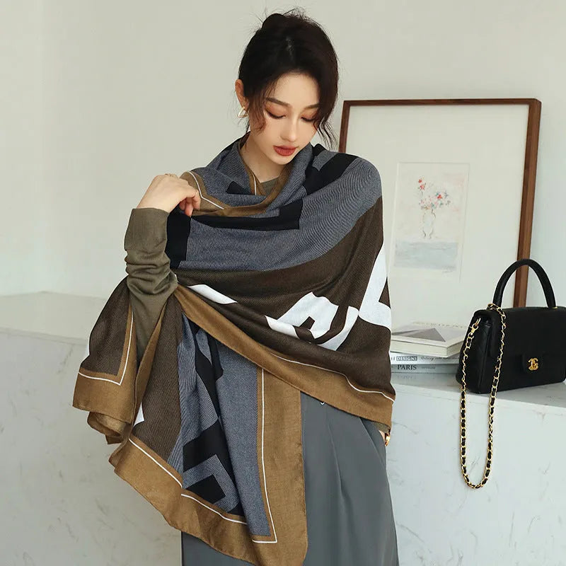 Women's printed polyester scarf showing decorative pattern and mid-length dimensions for autumn wear