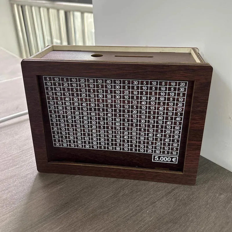 Wooden retro digital coin bank with digital display on modern simple desk.