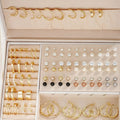 108 geometric pearl earrings in gold and yellow electroplated alloy colours