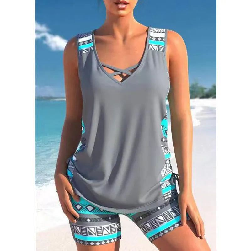 Blue floral lace two-piece women's swimsuit with separate top and shorts.